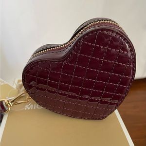 Michael Hearts coin purse wristlet in plum leather